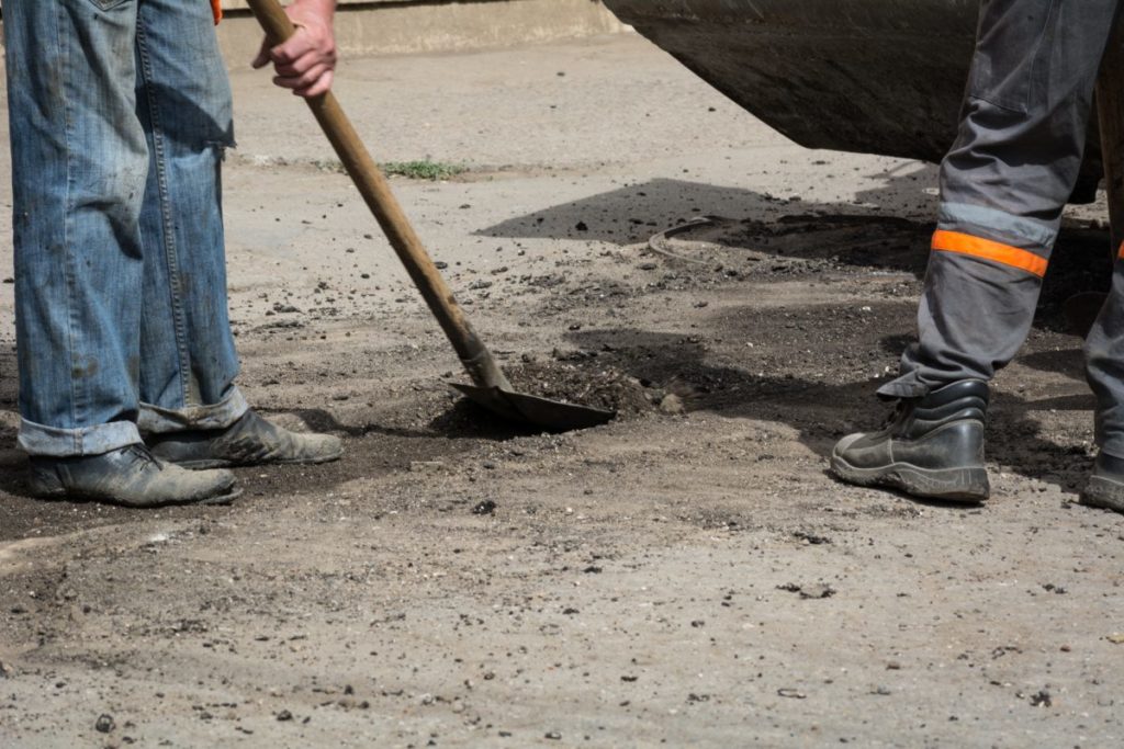 Concrete Driveway Resurfacing vs. Replacement for Drainage Problems After Snowmelt