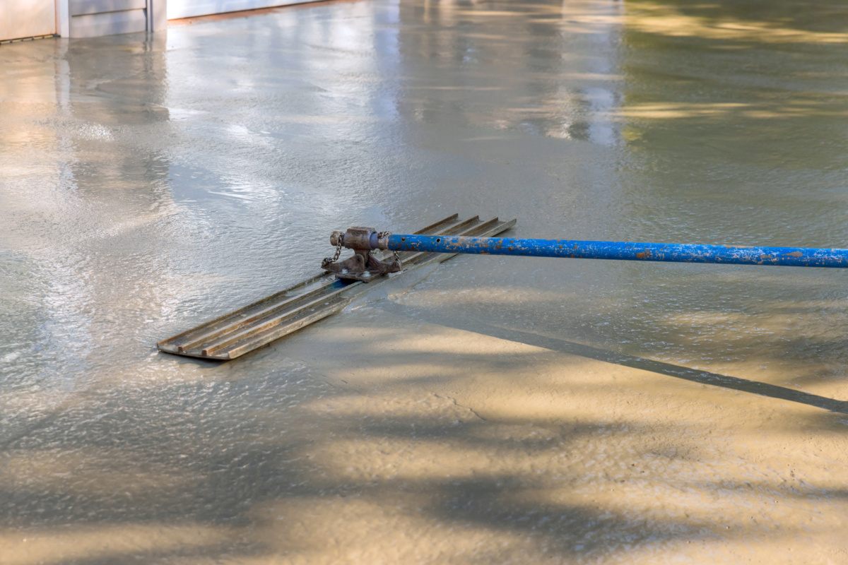 Concrete Driveway Resurfacing vs. Replacement for Drainage Problems After Snowmelt